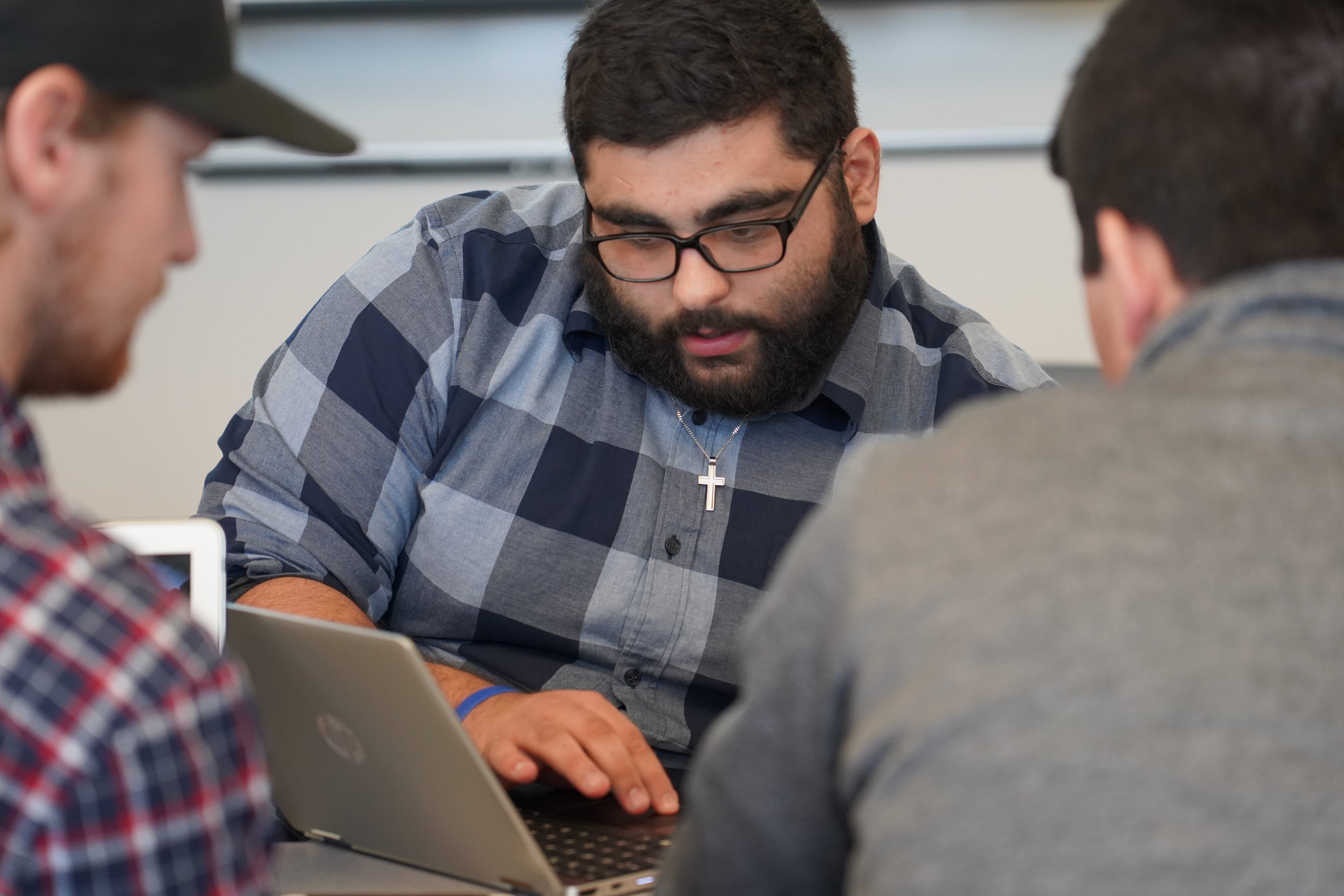 student using a laptop computer